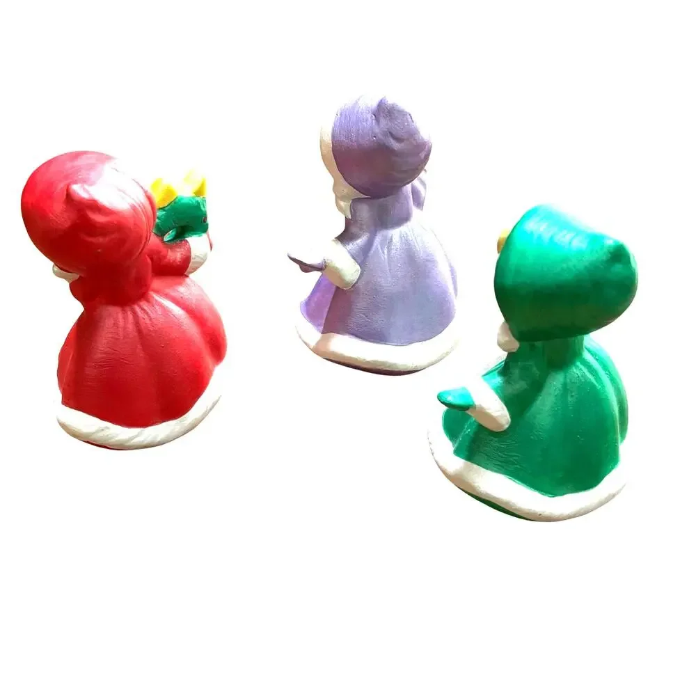 Vintage Christmas Girls Trio of ceramic holiday figures signed red green purple